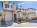Lovely two-story house boasting a charming front entrance with a well-kept lawn and a paved driveway at 2272 Platinum Band St, Las Vegas, NV 89156