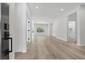 Bright, open living space with hardwood floors and fresh, neutral paint, perfect for modern living at 2579 Ivoryhill St, Las Vegas, NV 89135