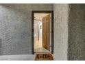 Charming entryway with an inviting welcome mat, offers a peek into a stylishly decorated interior space at 4200 S Valley View Blvd # 2085, Las Vegas, NV 89103