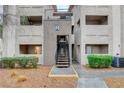 Well-maintained apartment building with landscaped grounds showing stairs leading to the upper units, and visible building signage at 4200 S Valley View Blvd # 2085, Las Vegas, NV 89103