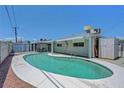 Backyard features an inviting private pool, perfect for relaxing and entertaining guests at 6205 Parsifal Pl, Las Vegas, NV 89107