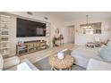 Cozy living room with modern shelving and entertainment center at 8136 Shady Glen Ave, Las Vegas, NV 89131