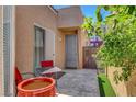 Private patio area with comfortable seating, perfect for relaxing outdoors at 9215 Penn Station St, Las Vegas, NV 89123