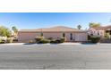 Single story house with tile roof and desert landscaping at 10389 Felice Ave, Las Vegas, NV 89135