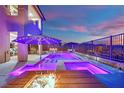 Inviting backyard pool with a lounge area, perfect for relaxation and entertainment at 12341 Ferry Glide Ave, Las Vegas, NV 89138