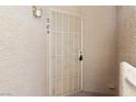 A protective white security door leads to the unit at 204 at 2191 Bay Club Dr # 204, Laughlin, NV 89029