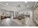 Spacious living room featuring modern decor, an open floor plan, and lots of natural light at 3131 Reverence Heights Ln, Las Vegas, NV 89138