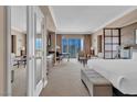 Comfortable condo suite featuring a kitchenette, seating area, and city views at 125 E Harmon Ave # 2907, Las Vegas, NV 89109