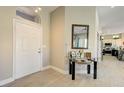 Welcoming foyer with tile flooring, high ceilings, and modern decor at 2625 Youngdale Dr, Las Vegas, NV 89134
