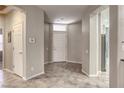 Open foyer showcasing tile flooring and entry to kitchen and bedrooms at 4124 Gliding Gulls Ave, North Las Vegas, NV 89084