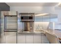 Condo kitchen features stainless steel appliances, sleek cabinets, and modern fixtures for efficient cooking at 4381 W Flamingo Rd # 3818, Las Vegas, NV 89103