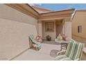 Inviting outdoor space with seating, ideal for enjoying fresh air and sunshine at 7934 Kiskadee St, North Las Vegas, NV 89084
