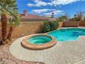 Inviting backyard pool and spa area, perfect for relaxation and entertaining at 8940 Emery Lake St, Las Vegas, NV 89123