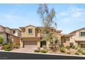 Stunning two-story home with beautiful landscaping, a neutral color palette, and inviting curb appeal at 12048 Portamento Ct, Las Vegas, NV 89138