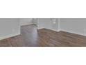 Open floor plan with modern wood-look floors at 1213 Star Meadow Dr, North Las Vegas, NV 89030