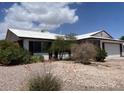 Single-story home showcasing the front yard with desert landscaping at 204 Bradshaw Way, Las Vegas, NV 89145