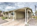 Inviting carport area leading to the front door of the home at 2825 Berg St, North Las Vegas, NV 89030