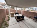 Outdoor patio area is perfect for relaxing or entertaining, with ample space for seating at 5024 Starfinder Ave, Las Vegas, NV 89108