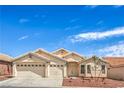 Inviting single-story home featuring a three-car garage, desert landscaping, and neutral stucco exterior at 8664 Frasure Falls Ave, Las Vegas, NV 89178