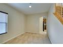 Spacious living room with neutral walls and carpet at 9019 Winchester Ridge St, Las Vegas, NV 89139