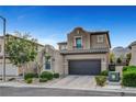 Charming two-story home featuring a well-manicured lawn and a spacious two-car garage at , Las Vegas, NV 89138