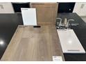 Interior design sample featuring luxury vinyl plank flooring, quartz countertop, and alabaster paint at 148 Silver Run Lane, Las Vegas, NV 89138