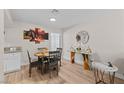Elegant dining area features a stylish table, modern decor, and neutral color palette at 2712 Holmes St, North Las Vegas, NV 89030