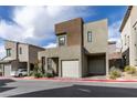 Modern two-story home with a neutral color palette and attached two-car garage at 649 Tranquil Jade St, Las Vegas, NV 89138