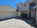 Charming two-story home with a well-manicured lawn and a spacious driveway at 6529 Bradford Ln, Las Vegas, NV 89108