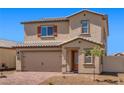 Charming two-story home featuring a brick driveway, neutral colors, and a convenient two-car garage at 6772 Violet Cascade Ave, Las Vegas, NV 89156