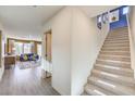 Open hallway with access to the living room, stairs and natural light at 794 Calm Crystal Ct # Lot 139, North Las Vegas, NV 89081