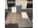 A kitchen material sample palette shows cabinet, countertop, floor, carpet, and paint color options at 143 Silver Run Ln, Las Vegas, NV 89138