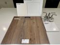 Bathroom samples include luxury vinyl plank, quartz countertop, cabinet paint, and faucet at 167 Silver Run Ln, Las Vegas, NV 89138