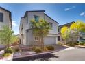 Inviting home with a well-maintained front yard, two-car garage and lovely curb appeal on a sunny day at 28 Verde Rosa Dr, Henderson, NV 89011