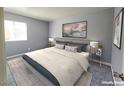 Empty living room features neutral tones, sliding glass doors and a carpeted floor at 4400 Sandy River Dr # 4, Las Vegas, NV 89103