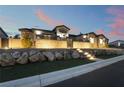 Charming single-story home exterior featuring stone accents, steps, rock landscaping and a well-kept yard at 5865 Alice Landing Ct, Las Vegas, NV 89149