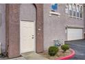 Inviting condo entrance with unit number, leading to a comfortable living space at 10001 Peace Way # 2231, Las Vegas, NV 89147