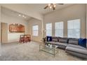 This living room features an open floor plan, comfortable seating, and ample natural light at 10001 Peace Way # 2231, Las Vegas, NV 89147
