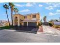 Inviting two-story home features a three-car garage and well-maintained landscaping at 1407 Fields St, Las Vegas, NV 89142
