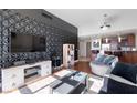 Inviting living room that transitions into a sleek, modern kitchen with stainless appliances at 150 Las Vegas Blvd # 1608, Las Vegas, NV 89101