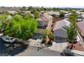 Overhead view of a two-story home, highlighting its position in a peaceful residential neighborhood at 2333 Silver Crew Pass, Henderson, NV 89052