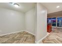 Open living space featuring herringbone floors, neutral walls, and city views at 4575 Dean Martin Dr # 2701, Las Vegas, NV 89103