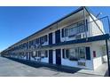 Long view of the building with identical balconies and shutters giving it a cohesive design at 4600 University Center Dr # 175, Las Vegas, NV 89119