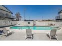 Inviting pool area with lounge chairs for residents to relax and enjoy the sunshine at 4600 University Center Dr # 175, Las Vegas, NV 89119