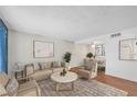Open living space featuring modern decor leading into a dining area at 595 S Royal Crest Cir # 24, Las Vegas, NV 89169