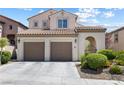 Charming two-story home with a two-car garage and well-maintained landscaping at 820 Colina Alta Pl, Las Vegas, NV 89138
