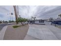 Well-maintained single-story home with a spacious driveway and desert-style landscaping at 2135 Sombrero Dr, Las Vegas, NV 89169