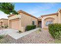 A charming one-story house with a well-kept yard and a two-car garage at 2231 Hallston St, Las Vegas, NV 89134