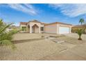 Charming single-story home featuring desert landscaping, stone accents and a private drive at 434 Viewmont Dr, Henderson, NV 89015