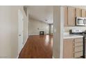 Open floor plan showcases updated kitchen with stainless steel appliances at 4517 Rodman Dr, Las Vegas, NV 89130